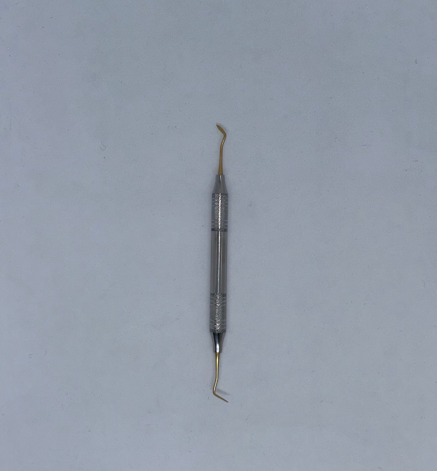 Hollenback golden plated carver for composite. Hollow handle