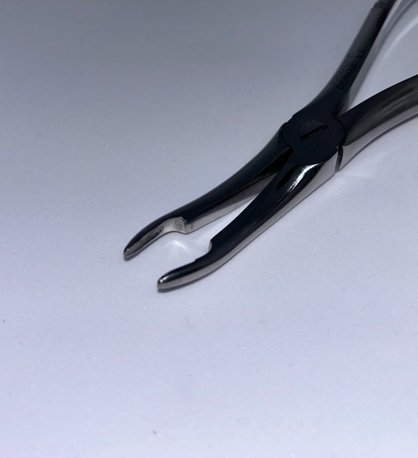 upper root forceps curved
