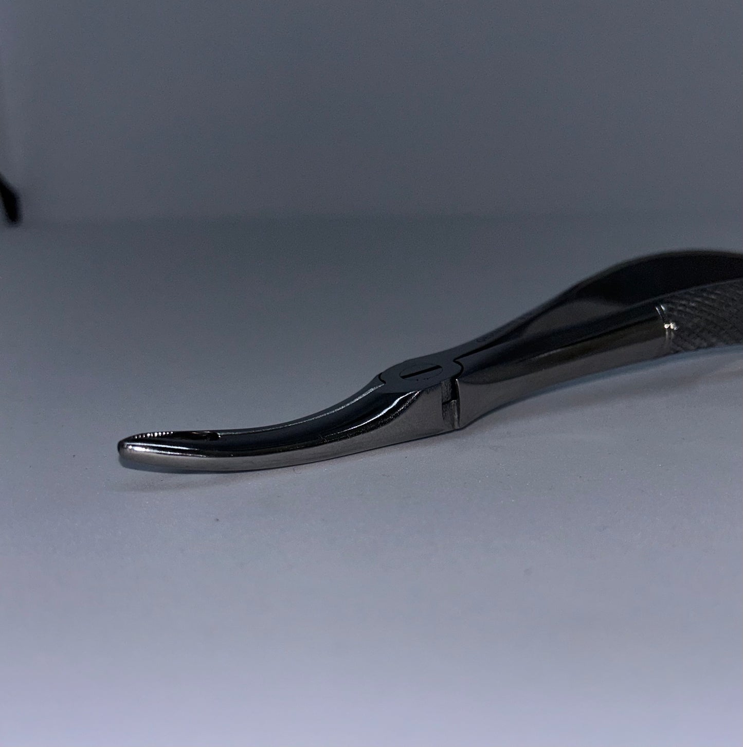 upper root forceps curved