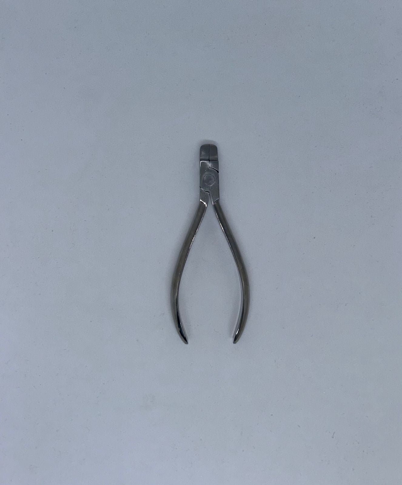 Orthodontic plier tweed (angle)