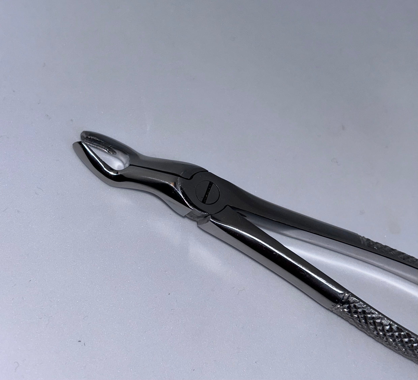 Upper wisdom forceps