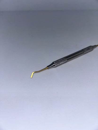 Plastic Filling Golden plated instruments for composite.