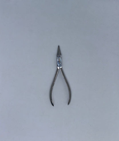 Orthodontic loop forming plier