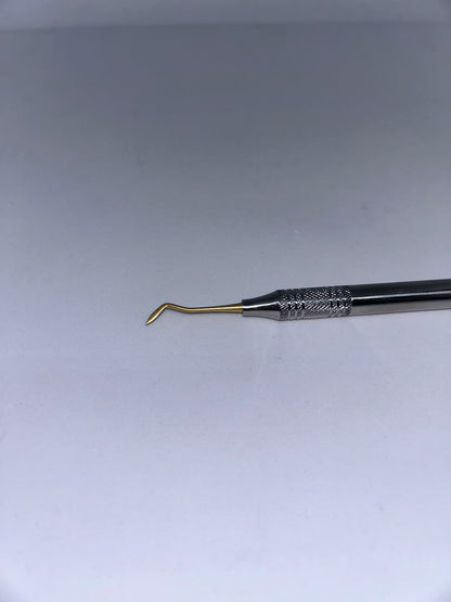 Hollenback golden plated carver for composite. Hollow handle